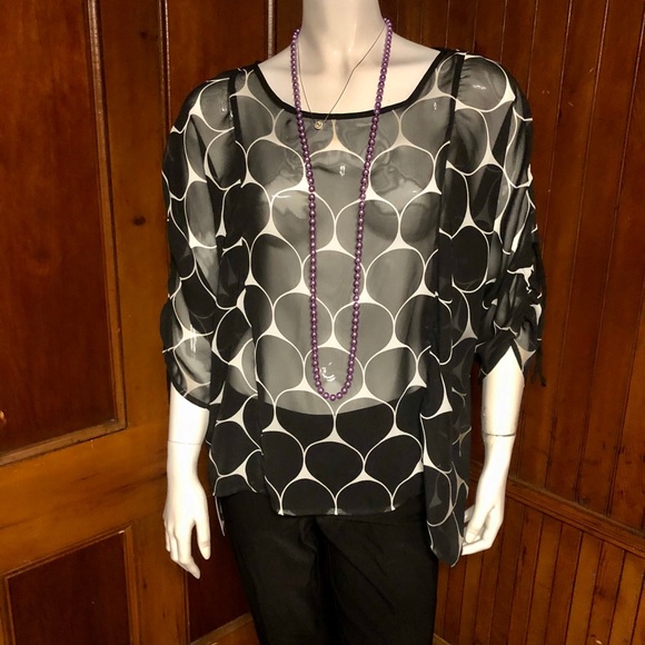 Black and white sheer blouse with peekaboo sleeve - Picture 3 of 6
